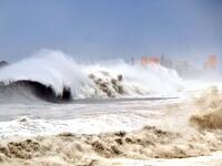 This CNA handout picture taken on September 15, 2018 shows giant large waves hitting the coast of Taitung county, eastern Taiwan, as typhoon Mangkhut approaches the southern Taiwan. 
CNA PHOTO / CNA / AFP