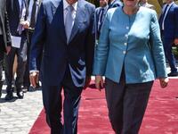 Lebanese Parliament Speaker Nabih Berri (L) receives German Chancellor Angela Merkel during her visit to Beirut, June 22, 2018. 
(AFP/Stringer)
