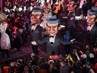 Statues of French President Emmanuel Macron and his wife Brigitte parade on the first day of the 135th Nice Carnival which runs until March 2 with the theme "King of Cinema," on February 16, 2019 in Nice, French Riviera.
VALERY HACHE / AFP