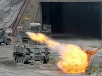 Members fo the UAE Armed forces perform a military drill during the opening of the International Defence Exhibtion and Confrence at the Abu Dhabi National Exhibtion Centre on February 17, 2019. 
AFP