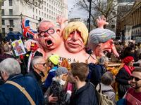 A combined model of (L-R) Britain's Environment, Food and Rural Affairs Secretary Michael Gove, Britain's former Foreign Secretary Boris Johnson and Britain's Prime Minister Theresa May is seen at a rally in central London on March 23, 2019. 
Niklas HALLE'N / AFP
