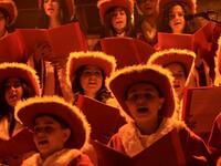 A Christian choir wearing cowboy hats sing during Christmas Eve celebrations, in the Ashrafiyeh neighborhood of east Beirut.