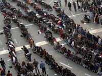 A closer shot to the demonstrators praying in central Cairo.