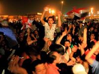 Egyptians in the Sudanni capital, Khartoum, hail the fall of Mubarak who succumbed to a series of popular protests that lasted for 18 days.