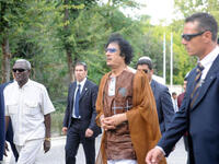 Gaddafi arrives in Italy - where Berlusconi is already in trouble with his female population - and invites 500+ women from an escort agency  for some &amp;#039;Islam&amp;#039; in a private self-delivered lecture inviting conversion.