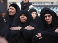 Shiite Muslim shiite women beat their chests in an Ashura ritual in the shrine city of Karbala, as believers prepare to mark the religious event of Ashura 17 in commemoration of ten days of mourning for Imam Hussein, the grandson of Prophet Mohammed who was killed in the Battle of Karbala.