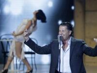 Lebanese singing star Ragheb Alameh performs during the Miss Lebanon 2011 beauty contest.