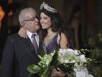 Yara Khoury Mikael is congratulated by her father after winning the Miss Lebanon 2011 beauty contest.
