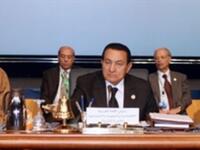 Egyptian President Hosni Mubarak chairs the opening session of the second Arab Economic Summit, with Kuwait's emir Sheikh Sabah al-Ahmad al-Sabah and Arab League Secretary General Amr Mussa.