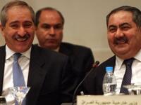 Foreign Ministers from Jordan Nasser Judeh (L) and Iraq Hoshyar Zebari.