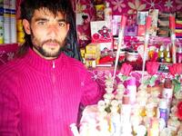 perfume shop refugee camp (UNHCR/ G. Beals)