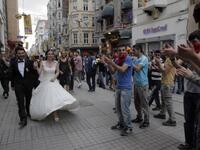 It’s all about peace, love and urban planning down at Taksim square, so what better place to head with your brand new life partner. The happy couple received quite the reception! Let’s hope she changed out of that dress before she met a Turkish policeman