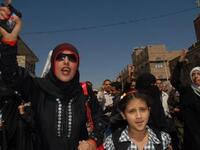Tawakel Karman (R), who heads a rights group, joins a protest calling for the ouster of Yemen's President Ali Abdullah Saleh.