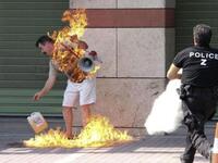 Greek man burns himself in protest