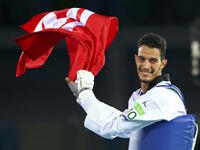 لاعب التايكواندو التونسي أسامة وسلاتي: برونزية وزن 80 كيلوغرام.