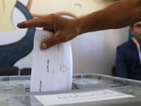 A man casts his ballot for Syria's first local elections since 2011, on September 16, 2018 in the southern Eastern Ghouta, on the eastern outskirts of the capital Damascus. (LOUAI BESHARA / AFP)