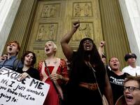 Demonstrators block the main entrance door as they take the steps of the US Supreme Court to protest against the appointment of Supreme Court nominee Brett Kavanaugh in Washington DC, on October 6, 2018. (Jose Luis Magana / AFP)


