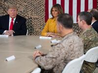 US President Donald Trump and First Lady Melania Trump attend a military briefing during an unannounced trip to Al Asad Air Base in Iraq on December 26, 2018.
SAUL LOEB / AFP