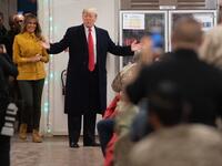 US President Donald Trump and First Lady Melania Trump arrive to visit members of the US military during an unannounced trip to Al Asad Air Base in Iraq on December 26, 2018.
SAUL LOEB / AFP