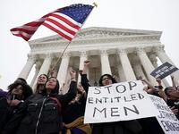 Activists occupy the front steps of the U.S. Supreme Court to protest against the confirmation Judge Brett Kavanaugh to the Supreme Court October 6, 2018 in Washington, DC.  (Alex Wong/Getty Images/AFP)