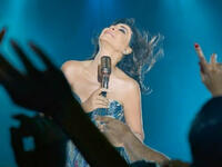 The new albums cover and booklet pictures seems to suit the albums songs mood