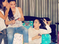 The Lebanese diva and her sisters sported casual looks with denim tight pants