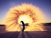 Frost effect hot water freezes man pours boiling water. (Shutterstock/ File Photo)