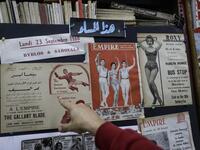 Abboudi Abu Jawdeh shows part of his vintage cinema poster collection at his office in the Lebanese capital Beirut  JOSEPH EID / AFP
