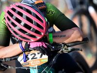 Competitors pay tribute to dceased competitor Fernando Civera in a minute of silence at the bivouac in Ouzina before the start of the cancelled Stage 3 of the 14th edition of Titan Desert 2019 mountain biking race near Merzouga, in Morocco on April 30, 2019. Fernando Civera passed away at km 55 of the stage two, the third stage of Titan Desert 2019 has been cancelled. FRANCK FIFE / AFP