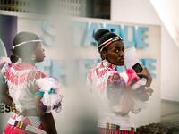 Young women dressed up in traditional attire wait for an audition organised by the Indoni Culture School in the South African city of Durban. Rajesh JANTILAL / AFP