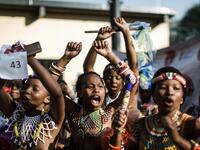 Young women dressed up in traditional attire sing and chant during an audition organised by the Indoni Culture School in the South African city of Durban. Rajesh JANTILAL / AFP