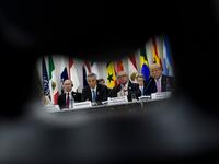 (from left) Russia's President Vladimir Putin, Singapore's Prime Minister Lee Hsien Loong, President of the European Commission Jean-Claude Juncker and US President Donald Trump listen during a meeting at the G20 Summit in Osaka on June 28, 2019.  Brendan Smialowski / AFP