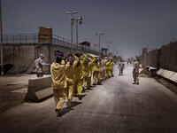 شغل  منصب شرعي عام في تنظيك القاعدة، حتى اعتقلته القوات الأمريكية عام 2003 في سجن بوكا في مدينة البصرة.