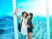 Festival goers attend the 2019 Coachella Valley Music And Arts Festival - Weekend 2 on April 21, 2019 in Indio, California. Presley Ann/Getty Images for Coachella/AFP