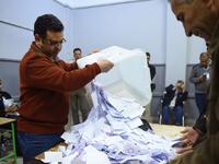 Egyptian officials count the ballots at a polling station in a school of the village of Shebin El Kom in the northern Nile delta province of Menoufia, on April 22, 2019, after the third day of a referendum on constitutional amendments. MOHAMED EL-SHAHED / AFP