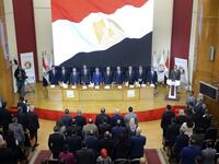 Chief of the National Elections Commission (NEC) Lashin Ibrahim (C) speaks during a press conference in the Egyptian capital Cairo on April 23, 2019 to announce the result of the referendum extending the rule of President Abdel Fattah al-Sisi. Egypt referendum extending Sisi rule passed with 88.83% of vote. MOHAMED EL-SHAHED / AFP