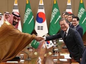 Crown Prince Muhammad Bin Salman, deputy premier and minister of defense, and South Korean President Moon Jae-In shake hands during a meeting at the Presidential Blue House in Seoul on Wednesday.