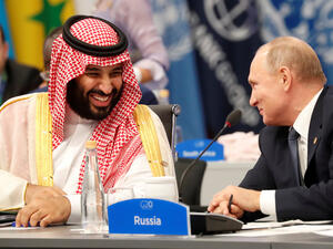 Mohammed bin Salman and Vladimir Putin at a working session of leaders at the G20 summit in Osaka, Japan.
