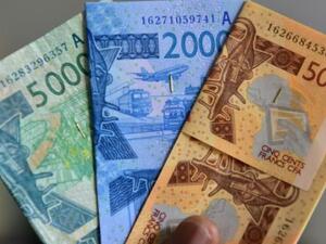  Some economists have urged West Africa to hold on to national currencies.