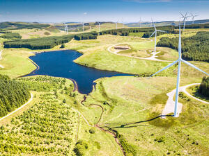 Within the UK, wind power is the largest source of renewable electricity and the second largest source of renewable energy after biomass.