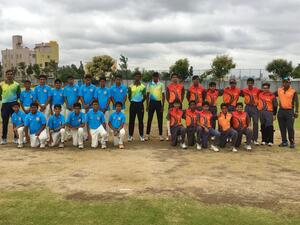 Members of Simply Cricket and Gopalan School teams pose before their match in Bangalore. - Supplied photo