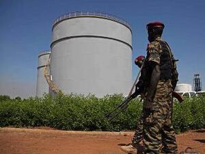 South Sudanese soldiers guard an oil refining facility.
