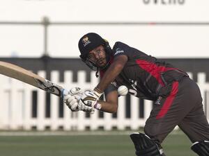 The UAE's Chirag Suri plays a shot during the match against Jersey at the Zayed Cricket Stadium. (Photo by Ryan Lim)