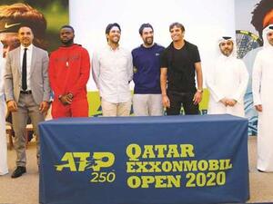 Tennis players Frances Tiafoe of the US (third left), Fernando Verdasco of Spain (fourth left), Jeremy Chardy of France (fifth left) and Makel Jaziri of Tunisia (sixth left) pose with tennis officials at the draw yesterday. (Photo: Gulf Times)