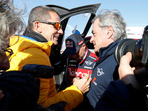 Bahrain JCW X-Raid Team's Carlos Sainz after winning the Dakar Rally alongside Yann Le Moenner, CEO of A.S.O.