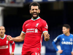 The Egypt international brought up a landmark at a remarkable time as the Reds drew 2-2 with their rivals in a dramatic fixture (Photo: goal.com)