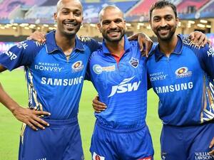  MI's Hardik Pandya and Krunal Pandya with DC batsman Shikar Dhawan. (IPL)