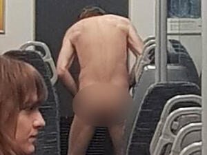 This is the shocking moment when a man gets completely naked on a London commuter train before being removed by police.