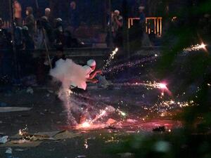 Indonesian protesters throw stones at riot police during a demonstration against the re-election of Indonesian president in Jakarta on May 22, 2019. (AFP/ File)