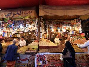 Yemenis shop for sweets and dried fruits in the capital Sanaa on May 28, 2019, during the holy Muslim month of Ramadan and ahead of Eid al-Fitr celebrations. (Mohammed HUWAIS / AFP)